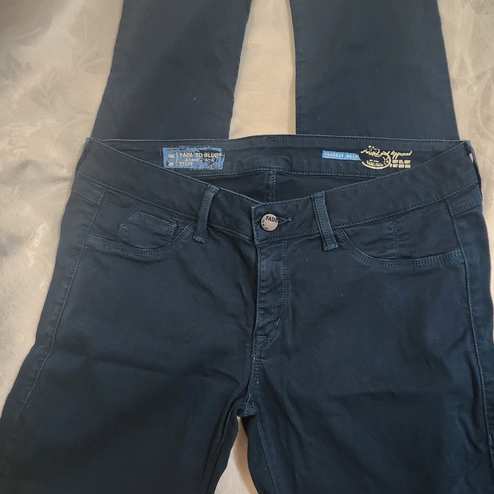 Classic Fade To Blue Skinny Jeans by Neiman Marcus